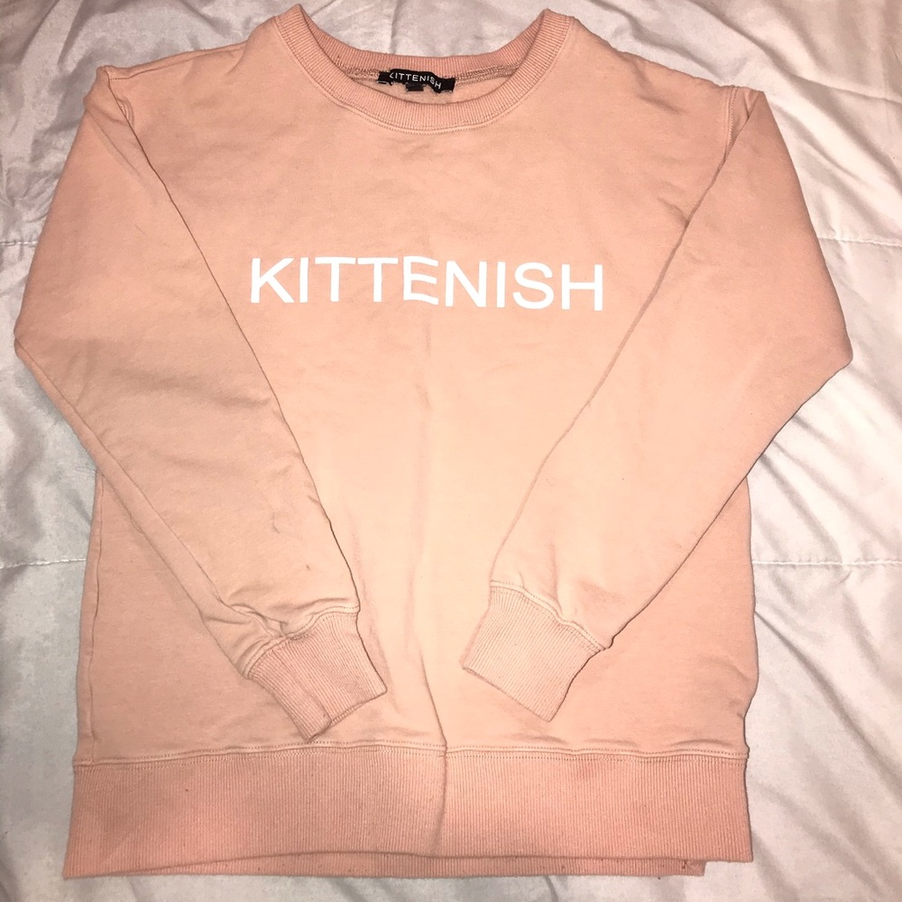 Kittenish peach sweater